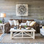 Farmhouse living room with brown sofa and great styling