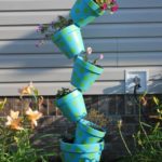 DIY πύργος λουλουδιών για τον κήπο11